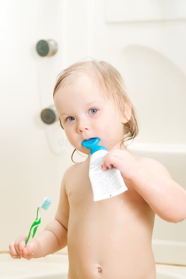 Adorable Baby Brushing Teeth In Shower Picture. Image 18806877