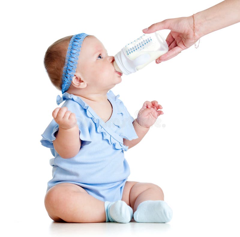Adorable baby girl drinking from bottle stock image Adorable baby girl drinking from bottle stock image