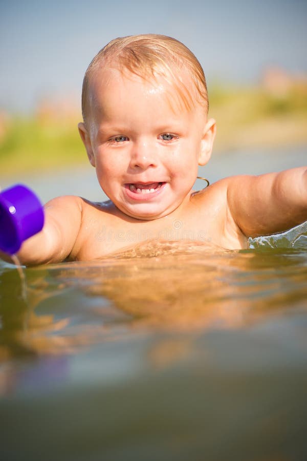 Adorable Baby Play in Water on Lake Beach Stock Photo Image of lovely