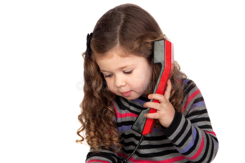 Adorable baby with a red telephone royalty free stock photo