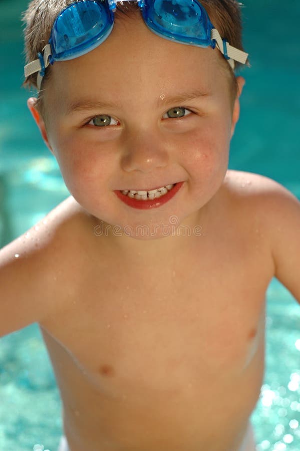 Adorable baby swimming