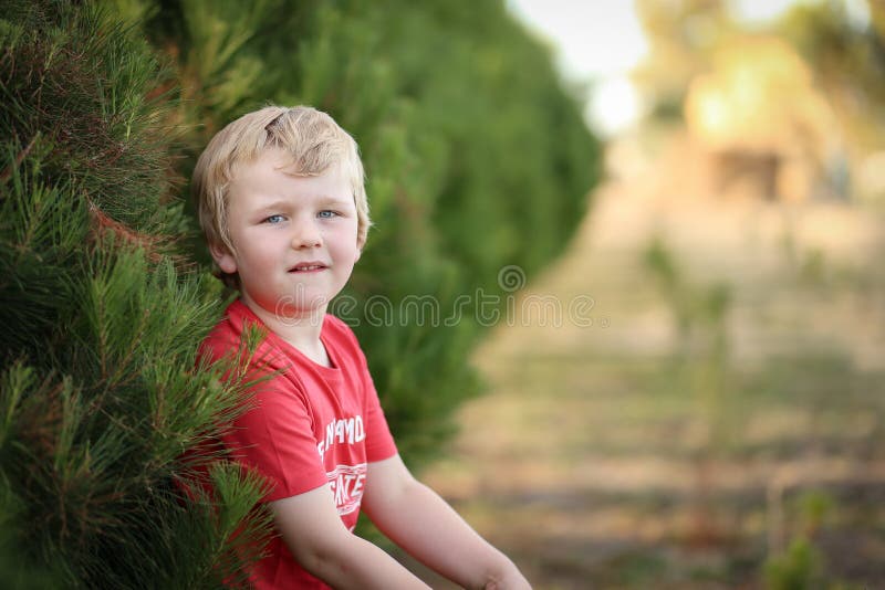 1. Cute little boy with blonde hair playing in the park - wide 3