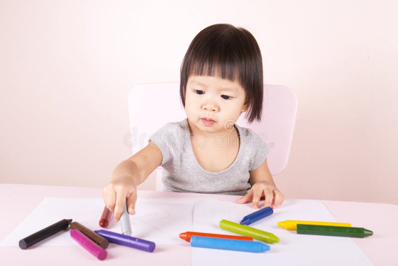 Adorable Child Drawing with Colorful Crayons. Stock Image Image of