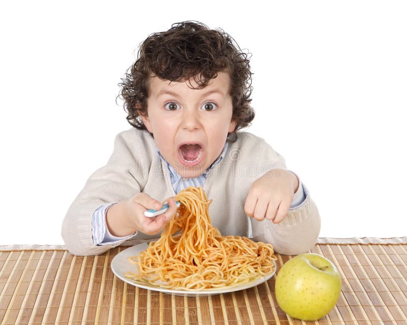 Adorable child hungry at the time of eating