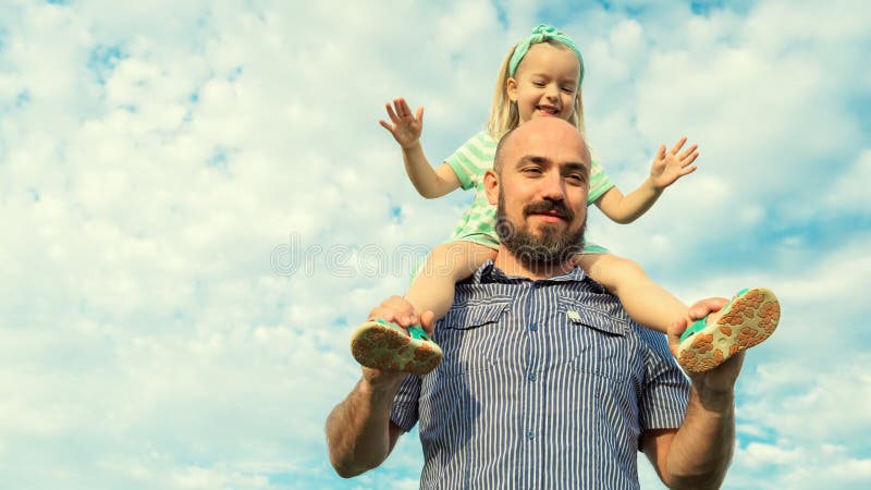 Adorable daughter and father portrait, happy family concept
