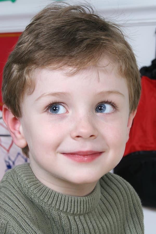 Adorable Four Year Old Boy with Big Blue Eyes stock image Adorable Four Year Old Boy with Big Blue Eyes stock image