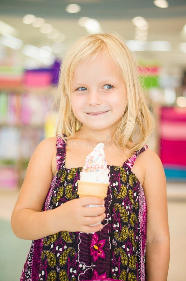 Adorable Girl Eat Fruit Ice Cream in Mall Stock Photo Image of shop