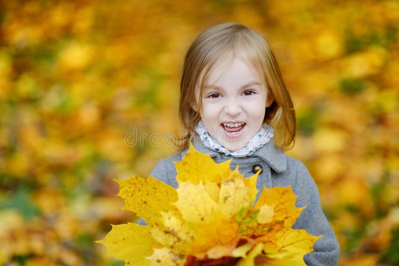 Adorable Girl Having Fun on Autumn Day Stock Image - Image of girl ...