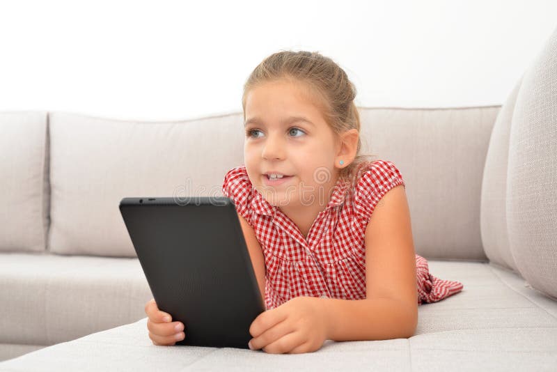 Adorable Girl Learning with Her Tablet Device Stock Image Image of