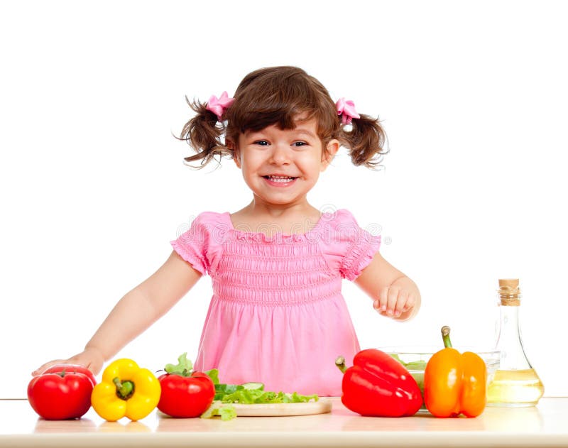Adorable kid girl preparing healthy food stock photography Adorable kid girl preparing healthy food stock photography