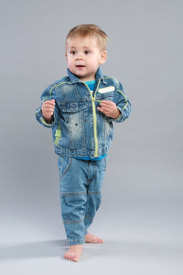 Adorable Little Boy In Jeans Stock Image Image of funny, peaceful