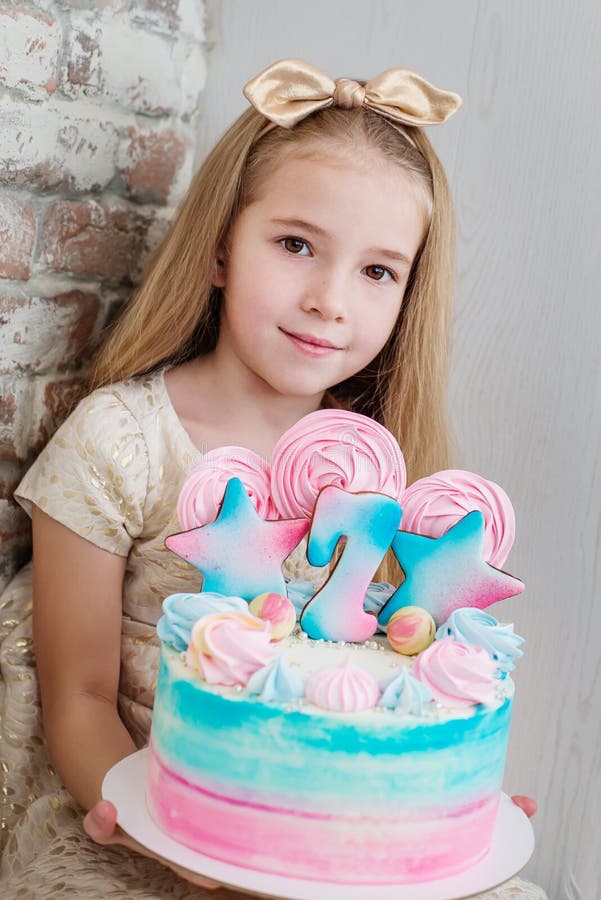 Adorable little girl with a birthday cake royalty free stock photo Adorable little girl with a birthday cake royalty free stock photo