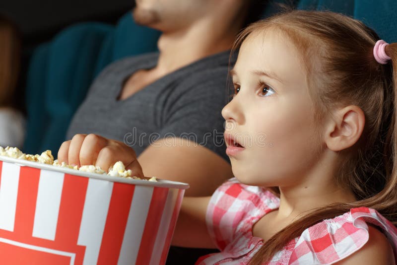 Adorable little girl at the cinema stock photography Adorable little girl at the cinema stock photography