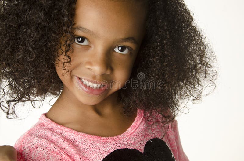 Adorable little girl with curly hair