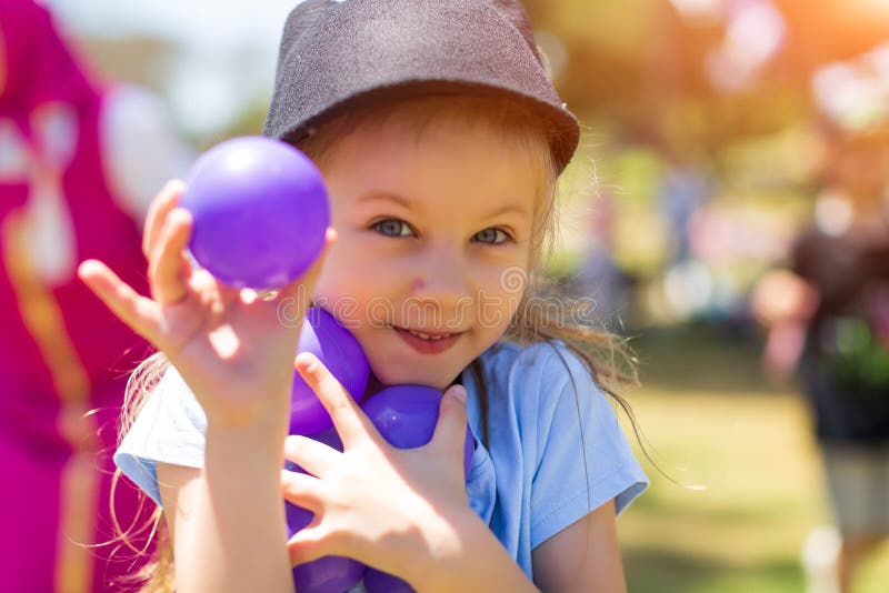 Happy baby smiling. Little girl running in the park stock photo Happy baby smiling. Little girl running in the park stock photo
