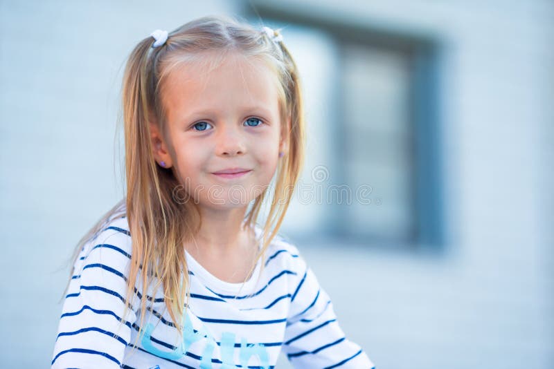 Adorable little girl have fun outdoors