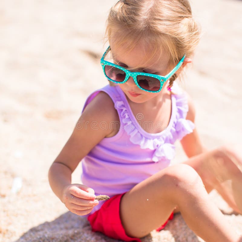 Adorable little girl outdoors during summer