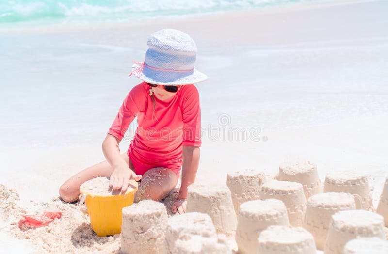 Adorable Little Girl Playing with Beach Toys during Tropical Vacation ...