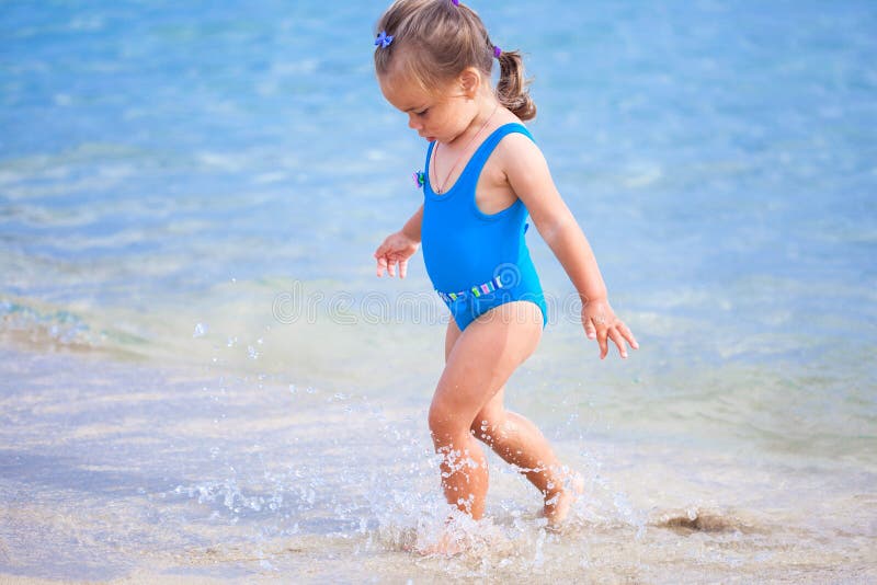 Adorable Little Girl Standing on Tropical Beach Stock Image - Image of ...