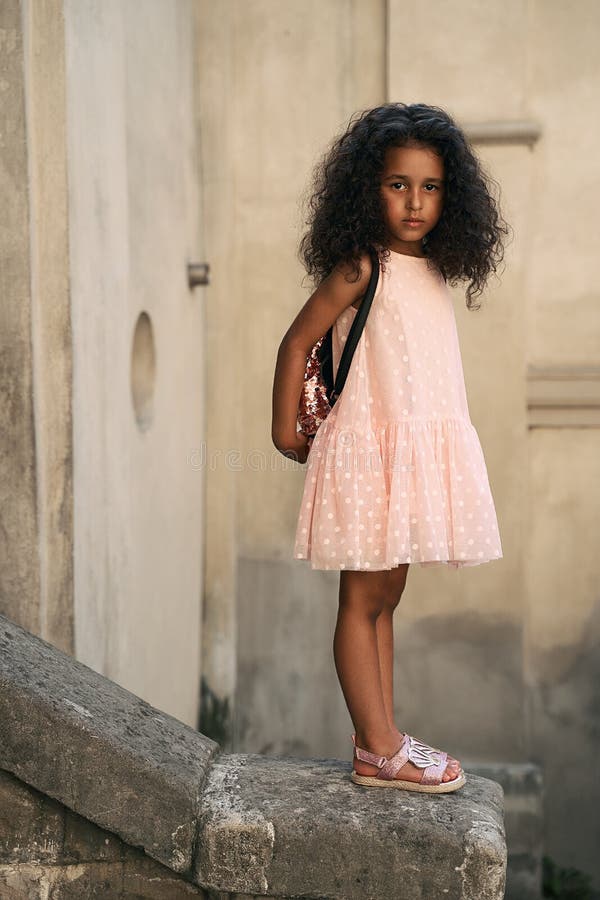 little girl wearing sandals