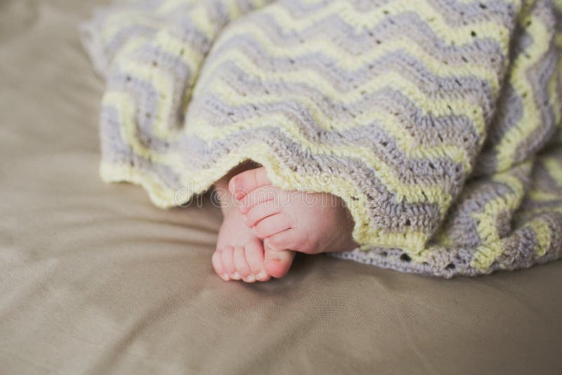 Adorable newborn baby feet