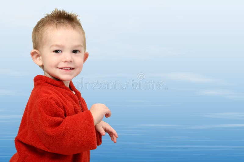 Adorable One Year Old in Red Sweater on Blue Sky
