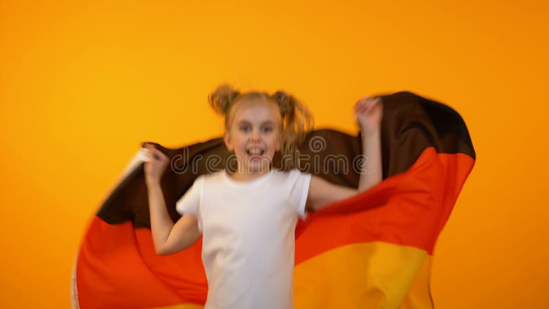 Adorable Preteen Girl Jumping with German Flag Cheering for Favorite Sport Team Stock Footage - Video of football, funny: 147450576