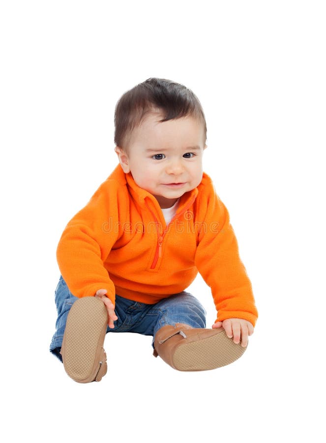 Adorable Six Month Baby with Orange Jersey Lying Stock Photo - Image of ...