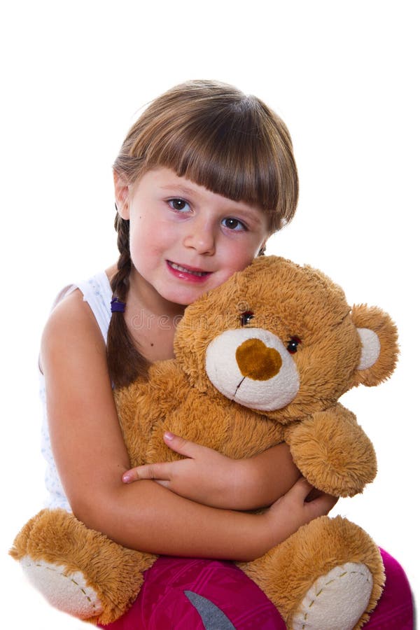 Adorable Toddler Girl Hugging a Teddy Bear Stock Photo - Image of ...