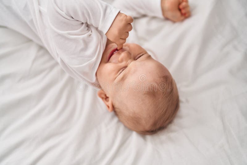 Adorable Toddler Lying on Bed at Bedroom Stock Photo Image of awake