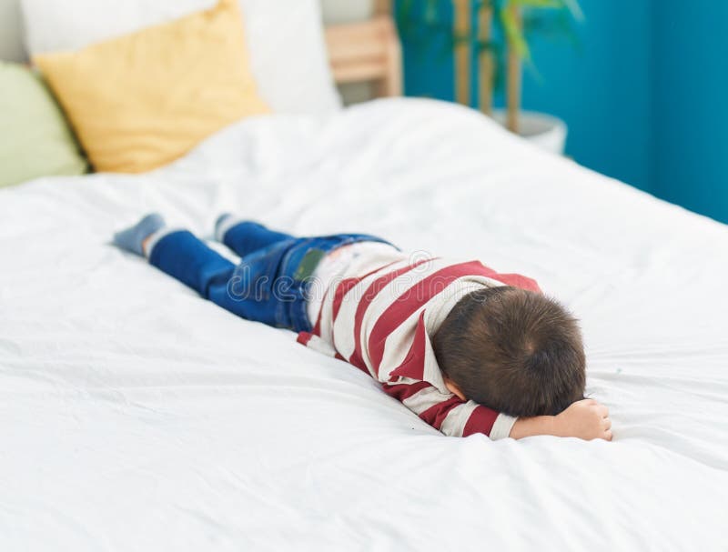 Adorable Toddler Lying on Bed Crying at Bedroom Stock Image Image of