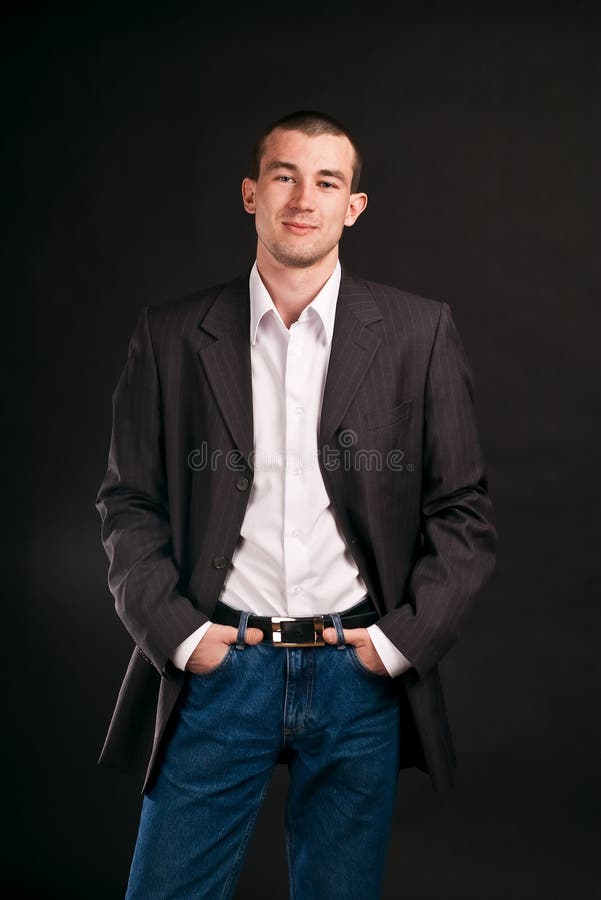 Adult businessman on a black background