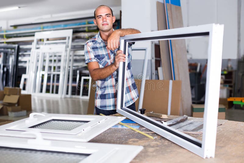 Adult Manager is Checking Quality of Work on Assembling Plastic Stock