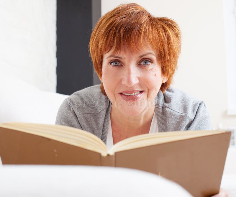 Adult woman reading book