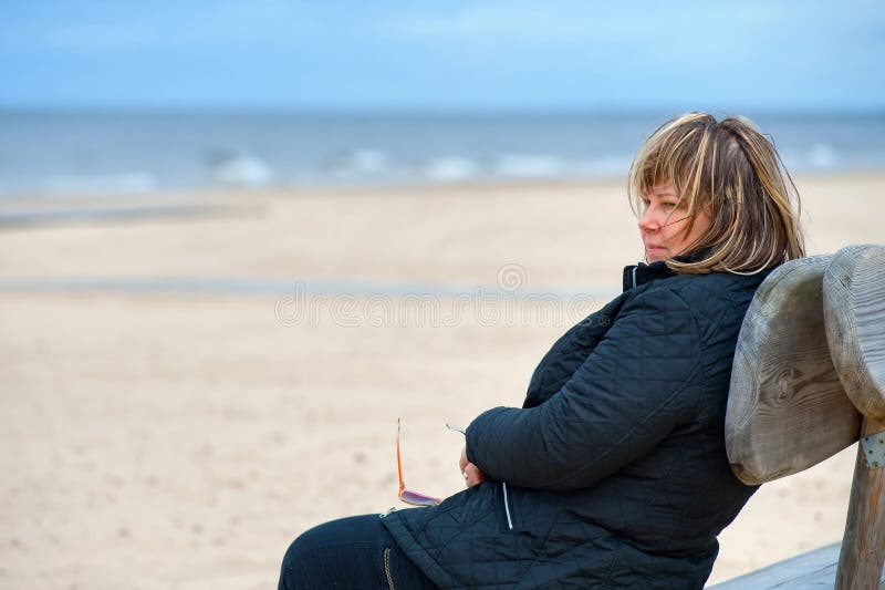 Adult woman at the sea