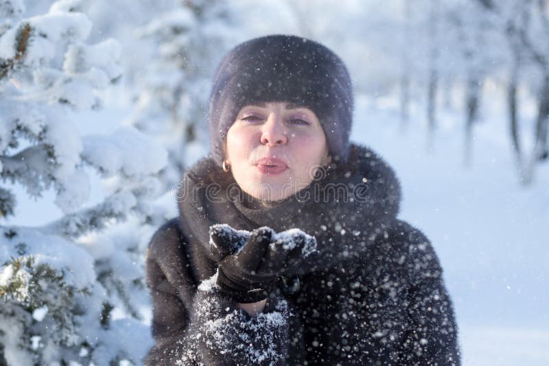 An Adult 40-year-old Woman in a Winter Park in a Mink Fur Coat and Hat ...
