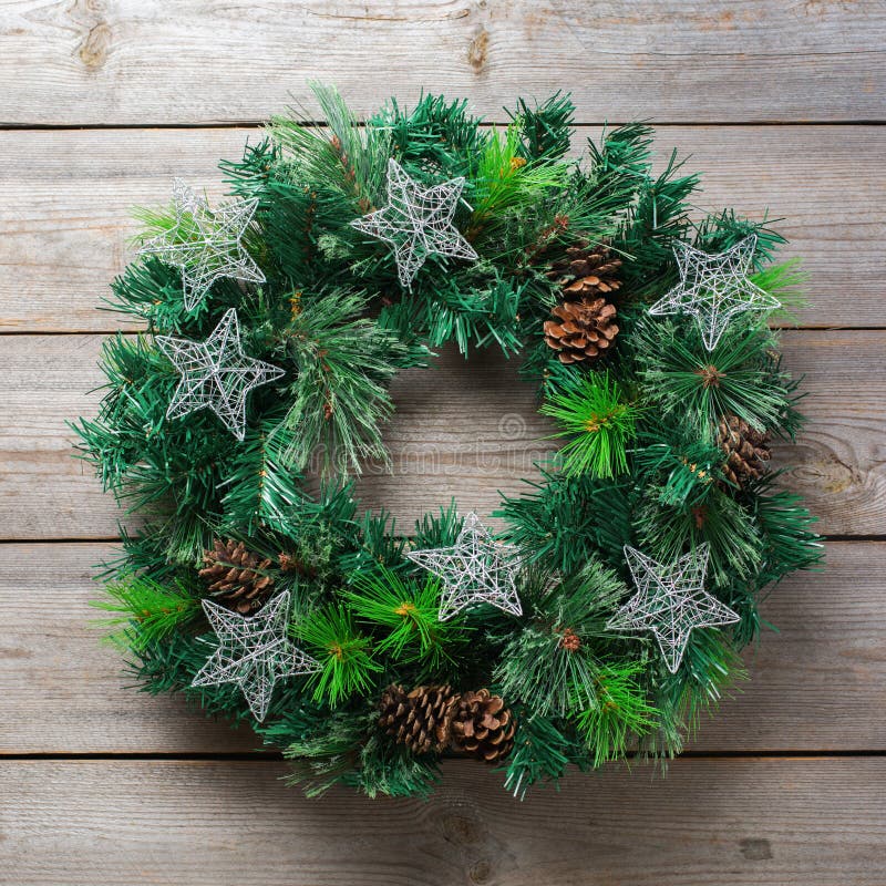 Advent christmas wooden door wreath with festive decoration stock photo Advent christmas wooden door wreath with festive decoration stock photo