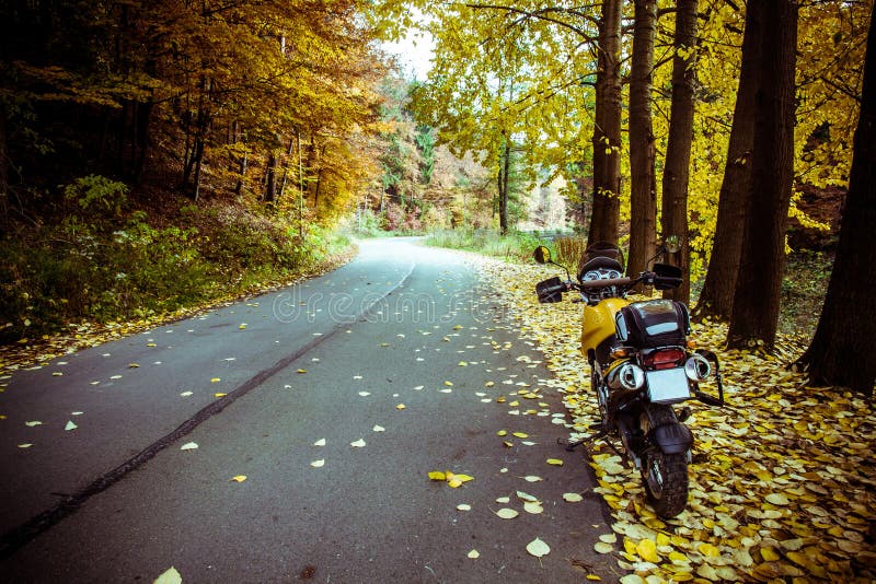 Adventure motorbike autumn road