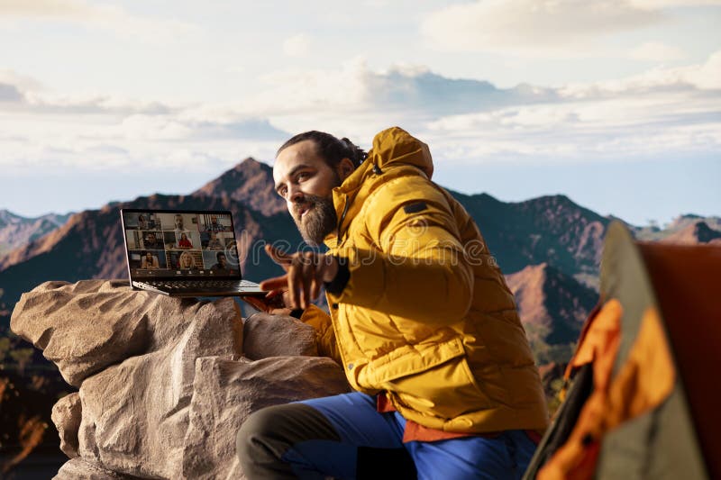 Adventure seeker having internet everywhere and using video call discussion stock image