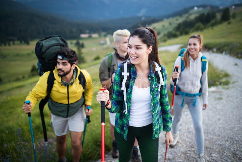 Adventure, Travel, Tourism, Hike and People Concept - Group of Smiling ...