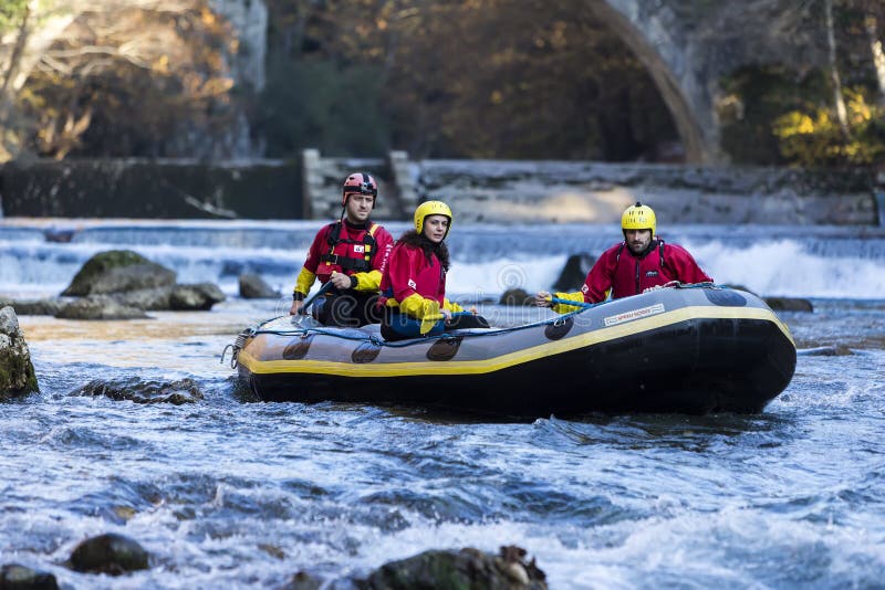 Adventurous Group Doing White Water Rafting the Rapids of River