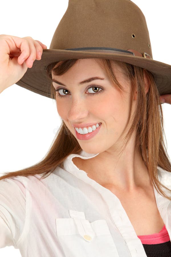 An attractive woman in white with a brown fedora. Adventurer adventure stock images, royalty-free photos and pictures