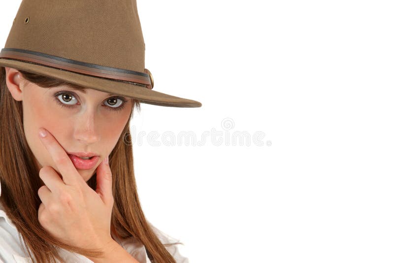 An attractive woman in white with a thoughtful look. Adventurer adventure stock images, royalty-free photos and pictures