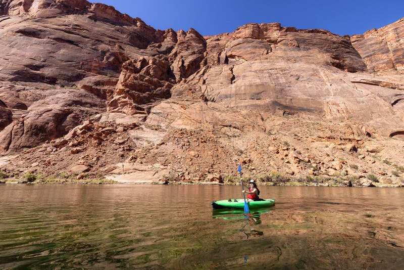 Adventurous Woman on a Kayak Paddling in Colorado River. Glen Canyon ...