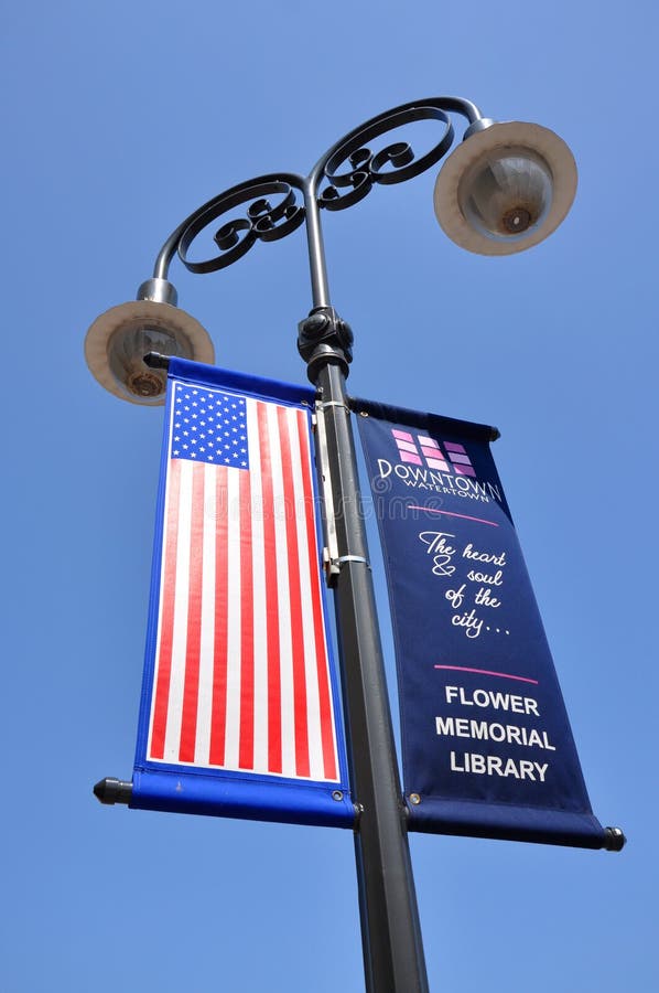 Advertising Flag in Watertown, NY, USA. Advertising Flag in Public Square in downtown Watertown, Upstate New York, USA royalty free stock photo Advertising Flag in Watertown, NY, USA. Advertising Flag in Public Square in downtown Watertown, Upstate New York, USA royalty free stock photo