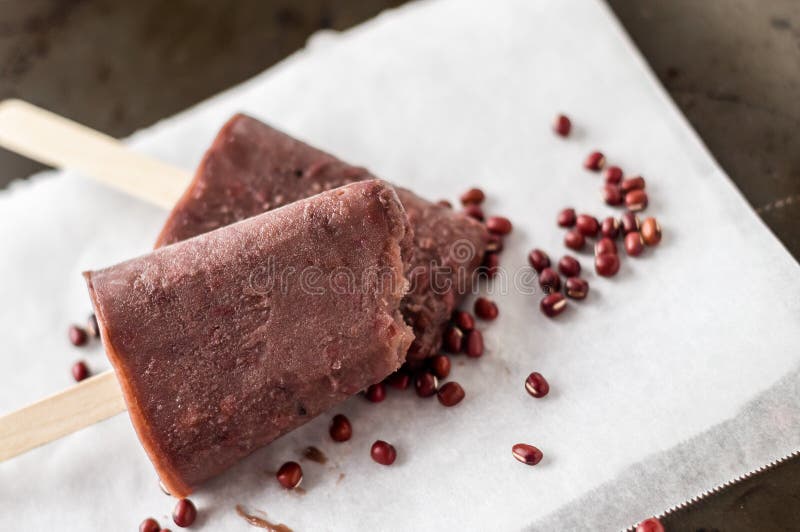 The perfect sweet treat to cool off during hot summer days, this homemade popsicle is made with asian adzuki red beans ice cream. The frosted beans add texture to the ice pops and also boost the nutritional value, making it an healthier dessert choice for kids. The perfect sweet treat to cool off during hot summer days, this homemade popsicle is made with asian adzuki red beans ice cream. The frosted beans add texture to the ice pops and also boost the nutritional value, making it an healthier dessert choice for kids