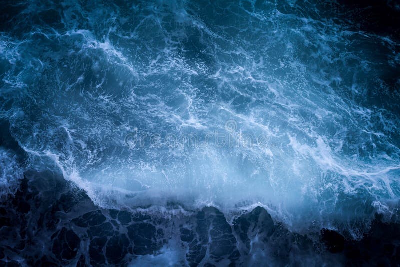 Aerial beautiful shot of sea waves with amazing water textures in the focus