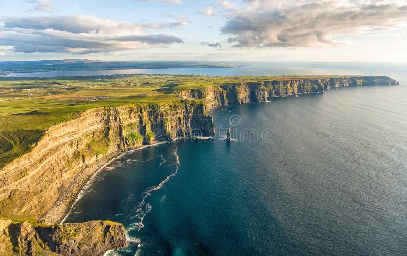 Aerial birds eye drone view from the world famous cliffs of moher in county clare ireland. Scenic Irish rural countryside nature