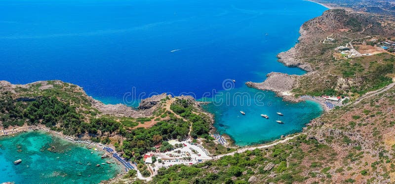 Aerial birds eye view drone photo Anthony Quinn and Ladiko bay on Rhodes island, Dodecanese, Greece. Panorama with nice lagoon and