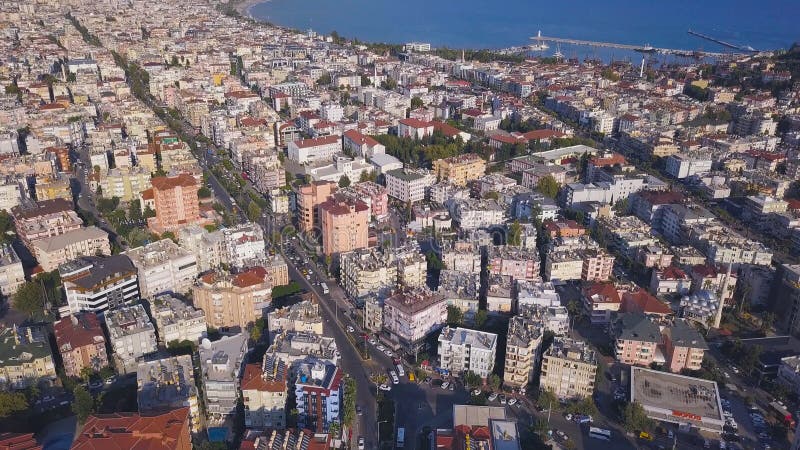 Aerial breathtaking view of the ocean coast and the city houses on cloudy blue sky background. Art. Amazing landscape. Aerial breathtaking view of the ocean royalty free stock photos Aerial breathtaking view of the ocean coast and the city houses on cloudy blue sky background. Art. Amazing landscape. Aerial breathtaking view of the ocean royalty free stock photos